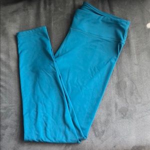 Turquoise Fabletics fleece leggings